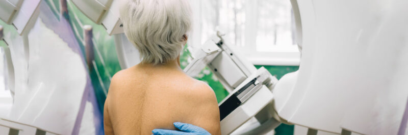 Senior woman having a mammography scan at hospital